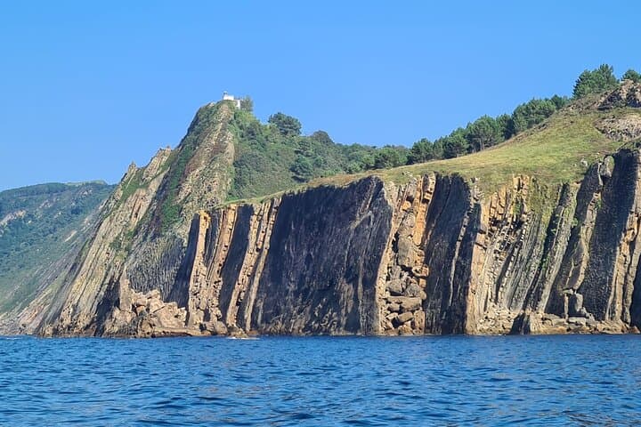 Tour in barca della baia con tramonto e Cava a San Sebastian