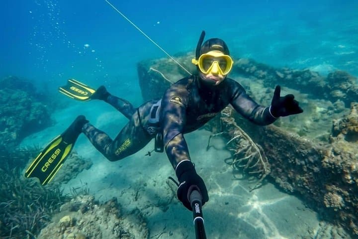 Tour in barca con snorkeling, scivolo, pranzo e prelievo — foto 4